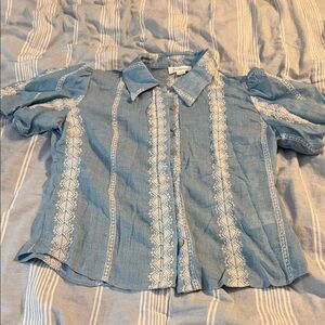 Blue Button-Up Blouse with Lace Details